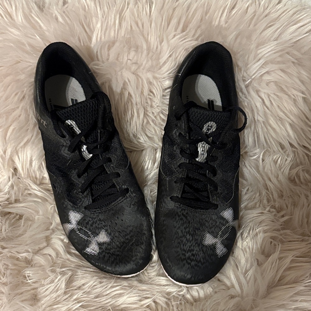 Under Armour Black and White Athletic Cleats